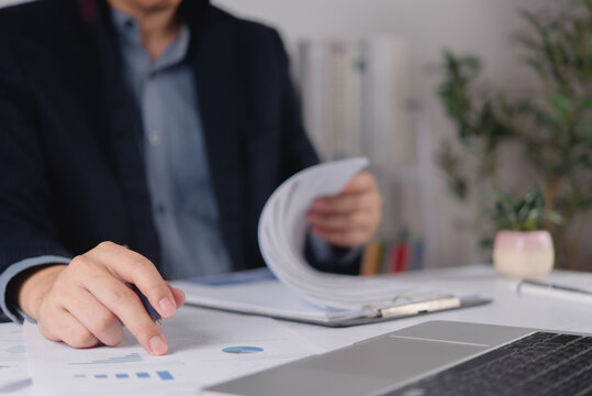 Business Data Analysis with Charts Reports and Laptop for Performance Review Strategic Planning Corporate Analytics and Data Driven Decisions