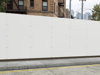 Naklejka premium Empty white hoarding fence mockup on urban street with brick building