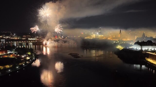 Ottawa, Canada, fireworks over Parliament Hill and the Ottawa River amid heavy smoke, haze and air pollution. g.