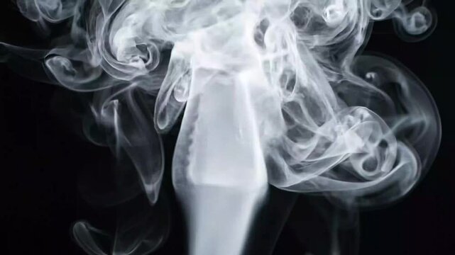 Fine Swirling White Smoke Jet Rising Upward Against Dark Background