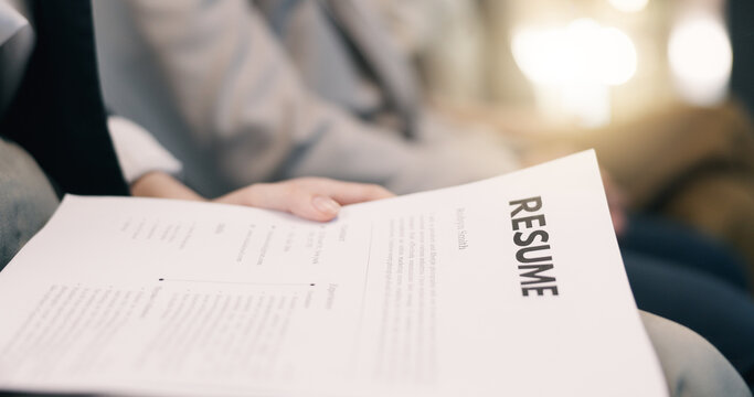 Hands, business and person in waiting room with resume, document and application for interview. Flare, candidate or cv in office with paperwork, employee form and work history for recruitment process