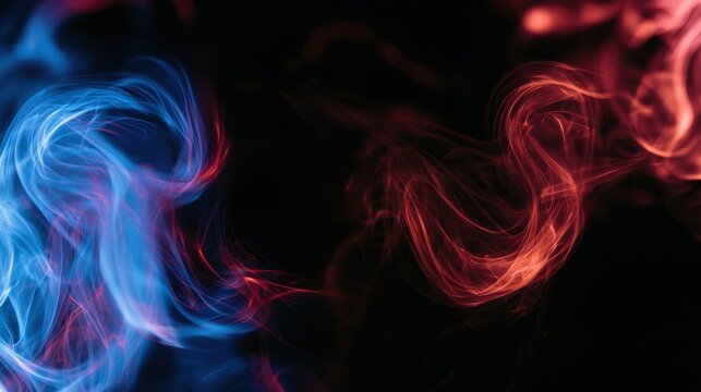 Swirling blue and red smoke against a black background during nighttime