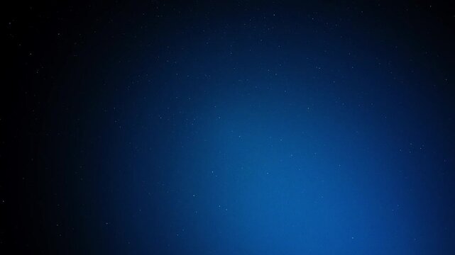Night sky presenting a gradient of dark blue and black with numerous stars scattered, symbolizing space, universe, and infinity