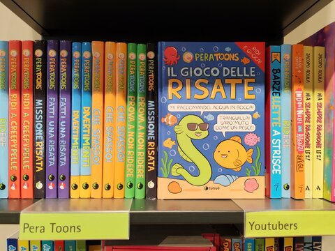 Rome, Italy - May 19, 2026, a series of children's books on display in a bookstore. The books by Pera Toons (pseudonym of Alessandro Perugini).