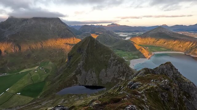 Panoramic High Aerial View of Dramatic Lofoten Mountain Peaks and Fjords at Golden Sunset Norway
