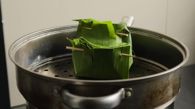 Indonesian Spiced Tofu Wrapped in Banana Leaves and Steamed