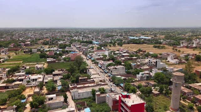 Aerial drone view of Punhana city and surrounding agricultural landscape in Haryana, India