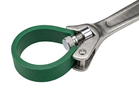 Strap wrench tool oil filter remover with green rubber strap for automotive repair, plumbing work, mechanical maintenance, industrial hardware service, adjustable spanner equipment isolated on black b