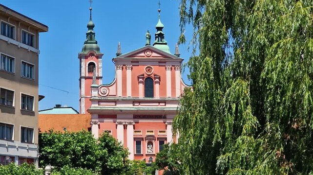 Franciscan Church of the Annunciation in Old Town of Ljubljana, Slovenia on Sunny Summer Day