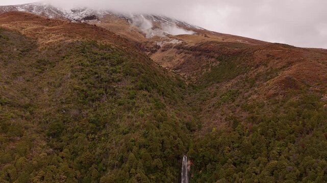 Stunning 4K 60fps drone footage of a beautiful waterfall flowing down the rugged terrain of Mount Tongariro. This famous New Zealand landscape served as the location for Mordor in Lord of the Rings