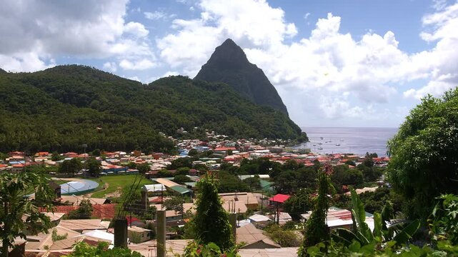 Tropical Caribbean view of Soufri&egrave;re, Saint Lucia &mdash; a charming seaside town framed by verdant jungle mountains, the sparkling bay, and the legendary Pitons.