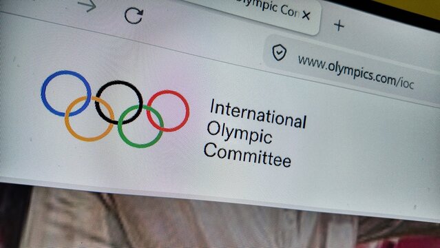  .a computer screen with international olympic committee   website displayed...