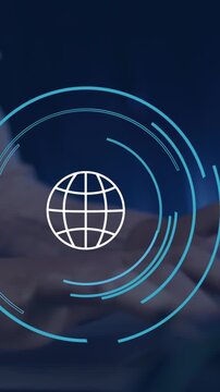 Animation of globe icon over caucasian businesswoman using laptop in office