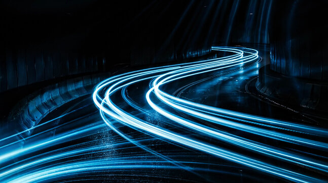 Abstract long exposure photograph of luminous electric-blue light ribbons bending gracefully across a slick, shadowed street, evoking relentless forward motion.