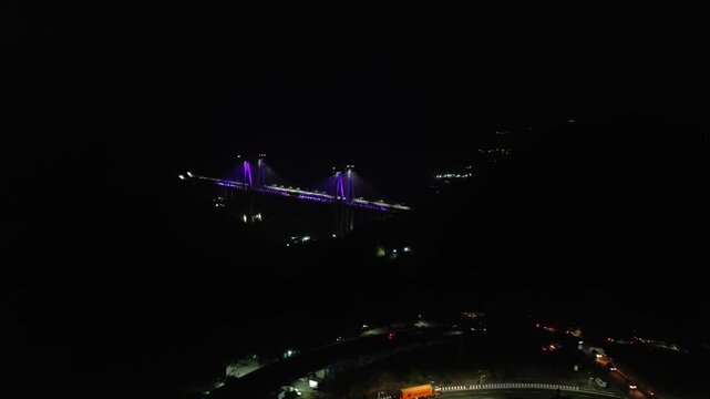 A breathtaking aerial night view of the Mumbai-Pune Missing Link, showcasing one of India&rsquo;s most advanced expressway projects illuminated under the night sky.