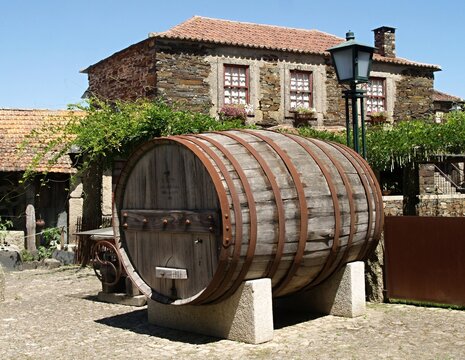 Wooden wine barrel representing Portuguese tradition in the village of Quintadona, Portugal - Norte