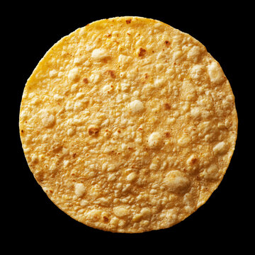 Stack of corn tortillas isolated on black background with clipping path, concept of traditional authentic cuisine
