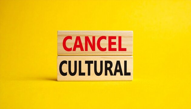 Cancel cultural phrase on wooden blocks with yellow background