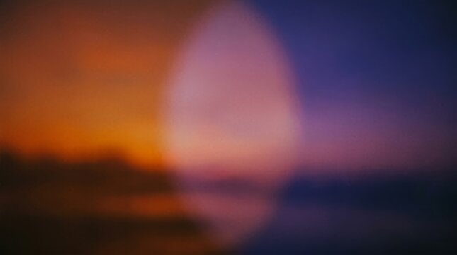 Blurred sunset gradient with warm orange, pink, purple tones