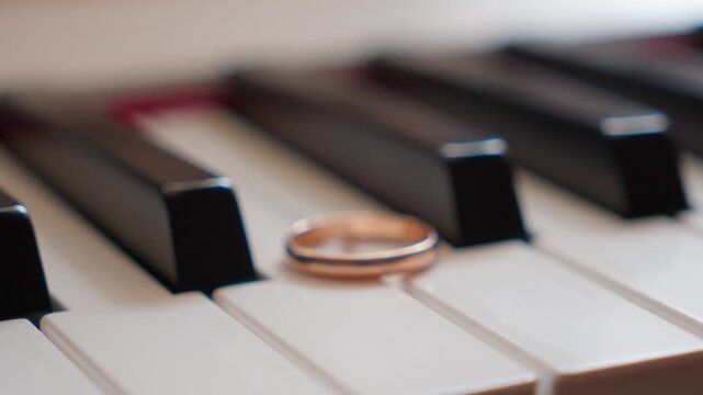 Wedding Ring On Piano Keys Focus Pull