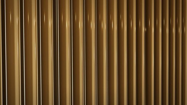 Fluted brass wall panel with moving light reflections, seamless loop background