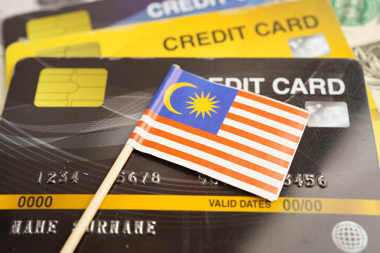 Malaysia flag on credit card, finance economy trading shopping online business.