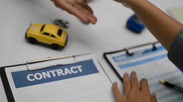 Woman signing auto insurance contract with agent after car crash claim. Trustworthy vehicle protection, policy coverage, and financial deal.