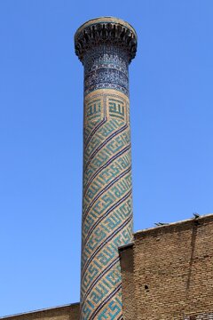 The Mausoleum of Amir Timur was built between 1399 and 1405. The tile decorations on the structure's walls are striking. The structure's minaret.
