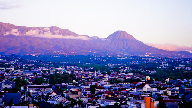 Beautiful view of Malang city with Mount Kawi in the background.