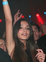 Fototapeta premium Happy girl dancing at a music festival club event
