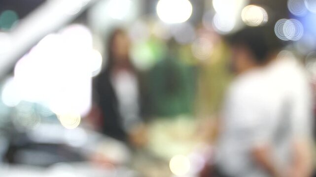 A motor show is a public exhibition that showcases current automobile models, debut concepts, and groundbreaking automotive technologies.Blur and Soft Focus.