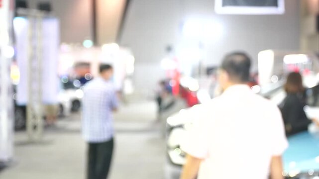 A motor show is a public exhibition that showcases current automobile models, debut concepts, and groundbreaking automotive technologies.Blur and Soft Focus.