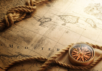 old maps and compasses © art designer