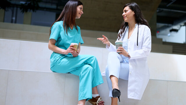 Healthcare professionals having coffee break and talking