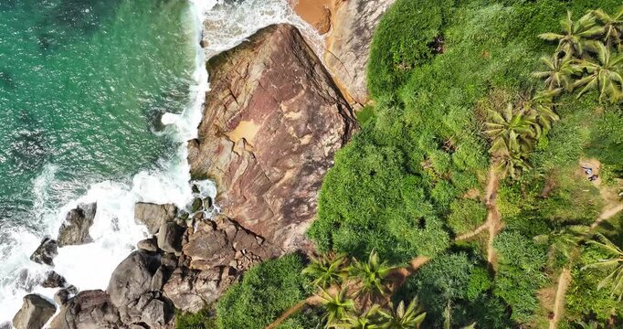 Aerial view of Karikkathi Beach near the Aazhimala Shiva Temple is a Hindu temple located on the coast of the Arabian Sea near Vizhinjam in the Thiruvananthapuram district of Kerala, India.