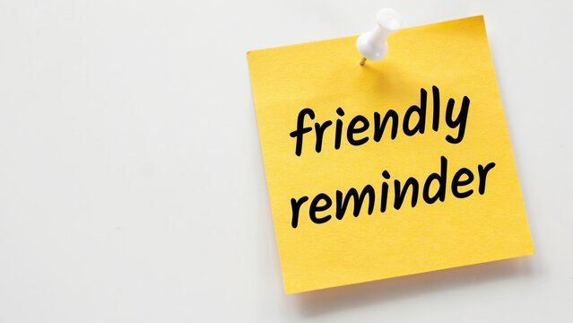 A yellow sticky note with friendly reminder text isolated on white background. Useful for business planning and office communication concepts.