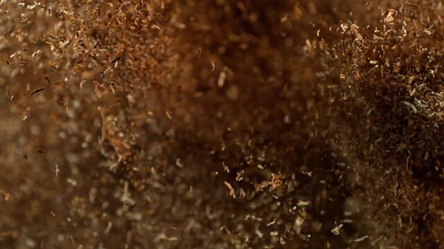 Super Slow Motion Shot of Tobacco Exploding Towards Camera at 1000fps.