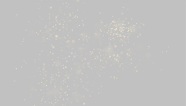 Delicate trail of soft golden light particles scattered on transparent background