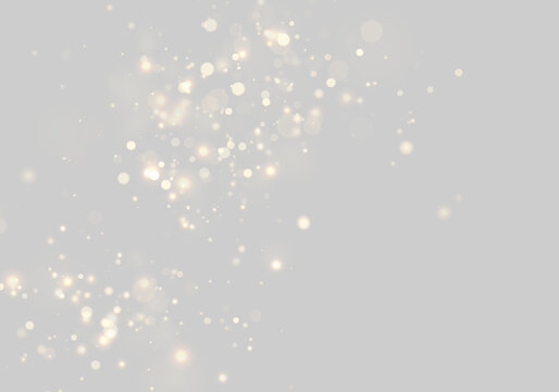 Soft golden bokeh sparkles scattered on transparent background with subtle glow on transparent background