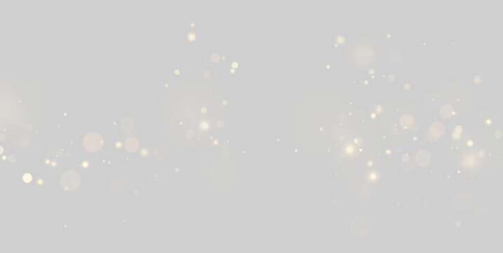 Soft golden glowing particles scattered on transparent background with gentle bokeh effect on transparent background