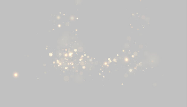 Soft golden bokeh lights scattered with glowing bright spots on transparent background