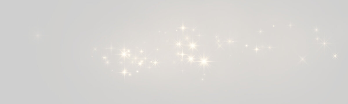 Scattered column of soft white sparkling light bursts on transparent background
