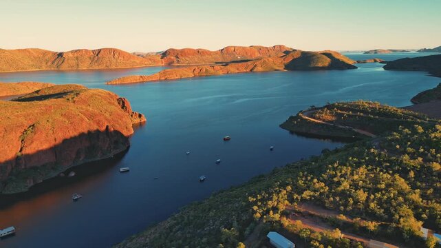 Cinematic drone shot of lake argyle in Australias outback during sunset.