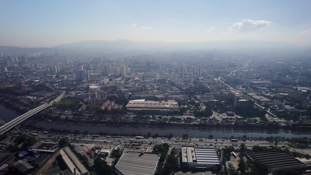 Drone flying really high with the Tiet&ecirc; rroad and Tiet&ecirc; river inthe frame. S&atilde;o Paulo Brazil