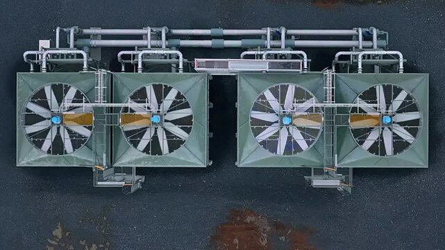 Aerial view of Direct Air Capture and Storage plant featuring large industrial fans and piping infrastructure in Olfus, Sveitarfelagid Olfus, Iceland.