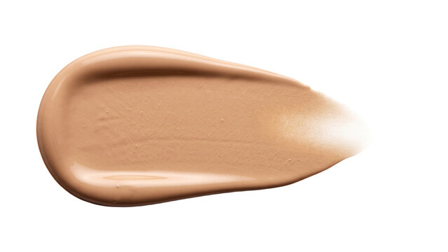 A smooth liquid foundation forms a broad organic cosmetic smear with softly feathered edges, isolated on white for makeup advertising, product presentation, beauty campaigns, packaging, and editorial.