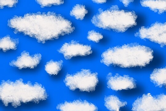Seamless pattern of fluffy white clouds on a blue sky background