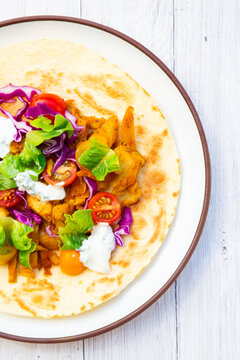 High protein wrap with vegetarian gyros and fresh vegetables