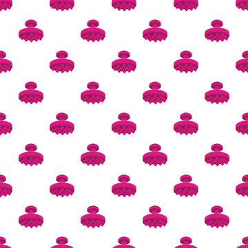 Pink scalp massager silicone shampoo brush pattern creating a repetitive background