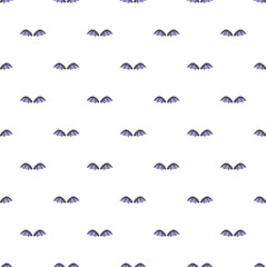 Fototapeta premium Repetitive bat wings creating a seamless pattern on white background